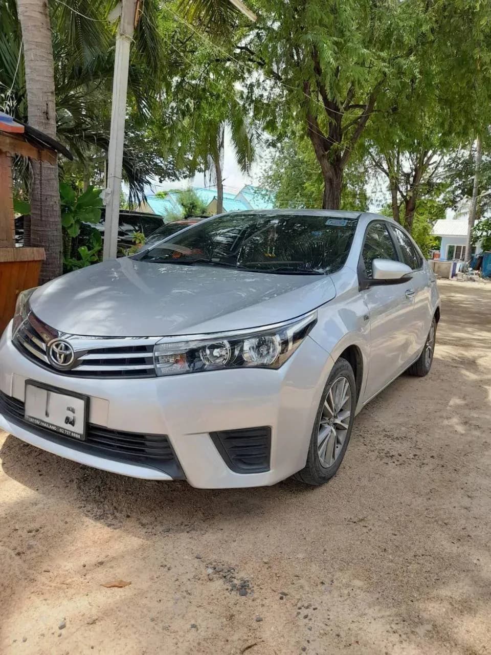 Toyota Corolla Altis (Silver) private car with driver