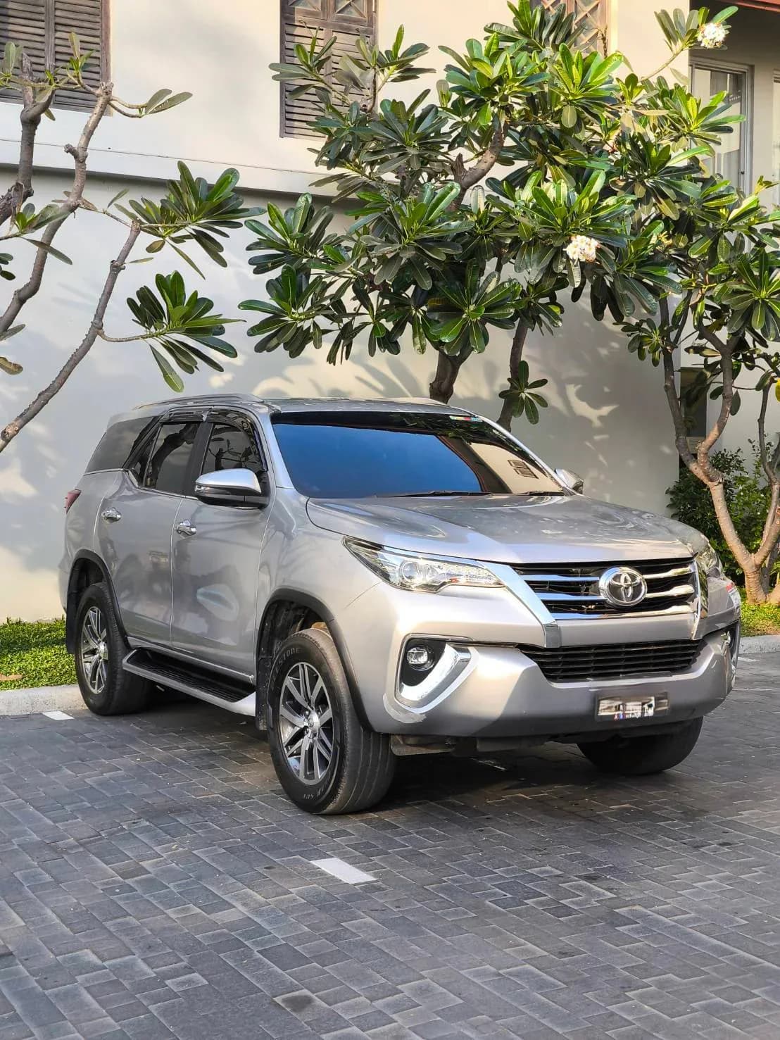 Toyota Fortuner (Silver) private car with driver